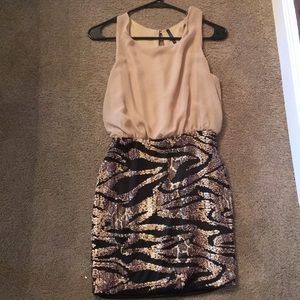 Cream, black, and gold sequins dress